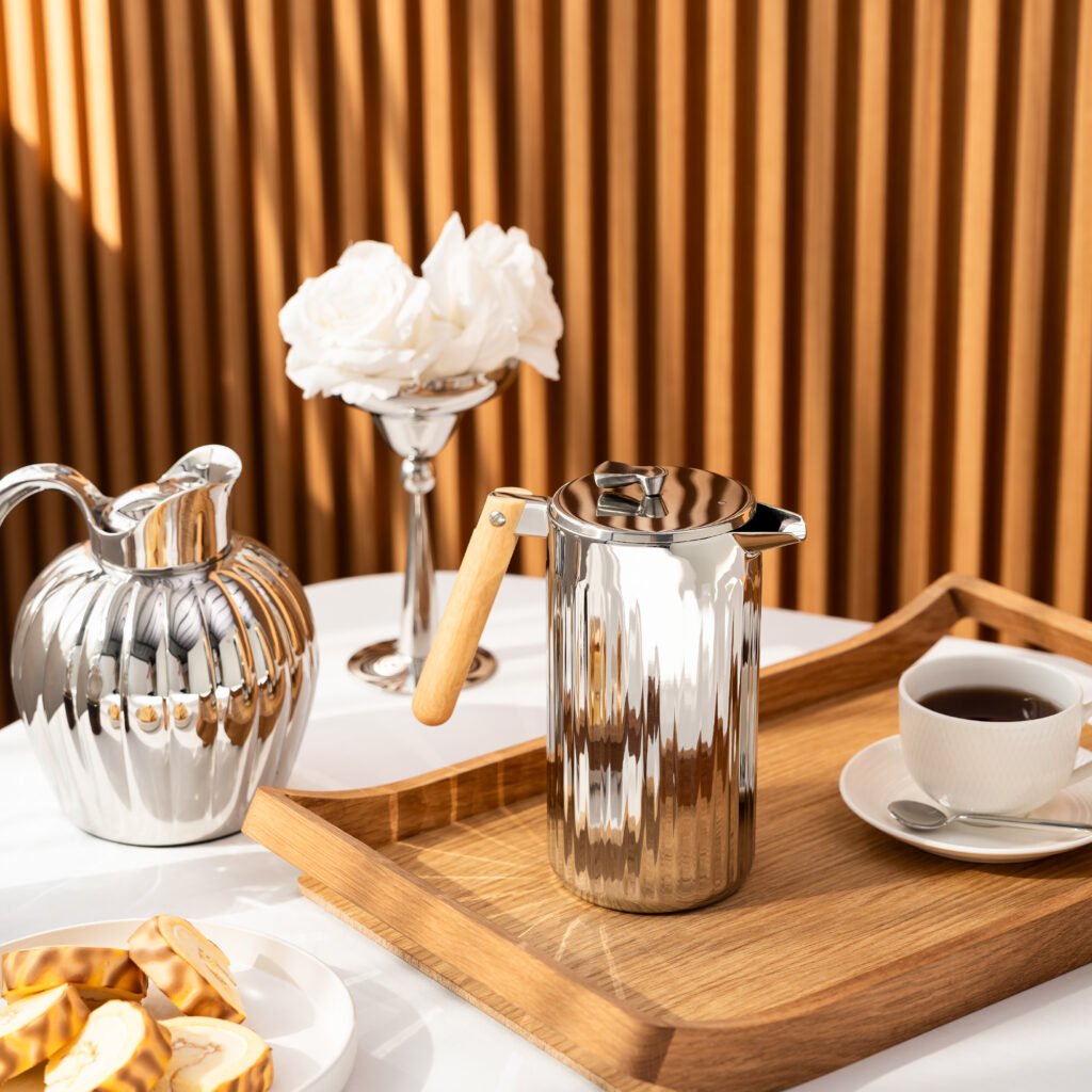 33 1 1 Steel Curved Pitcher for Avant-Garde Interiors - Premium Mirror Polished Stainless Steel Fluid Vessel by Apexerahomelife.