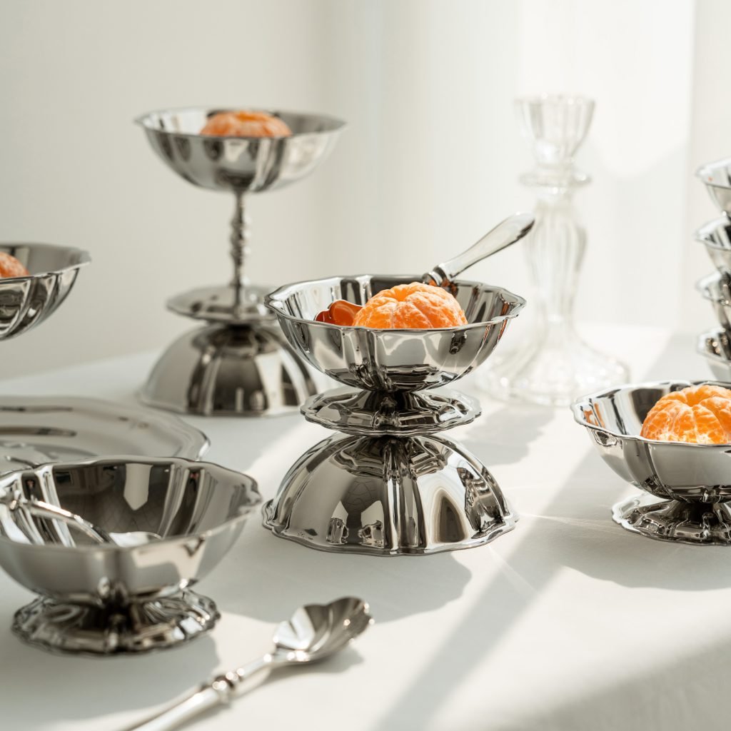 Steel Low Bowl (SS-87) featuring a mirror-polished, low-profile circular design for desserts, showcased as a Luxury Mirror Polished Sorbet Cup.