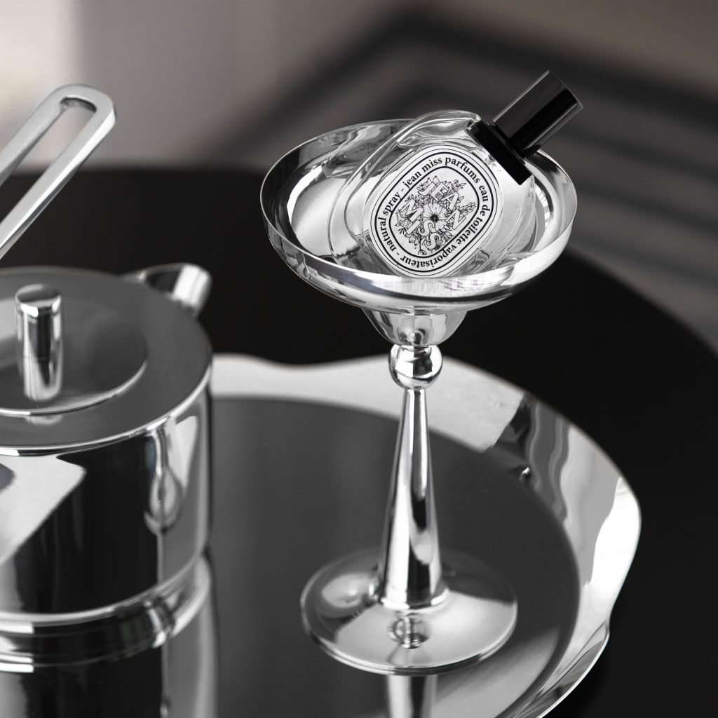 Steel Cocktail Glass (SS-88) featuring a mirror-polished Martini-style triangular bowl on a slim stem, showcased as a Luxury Mirror Polished Martini Coupe.
