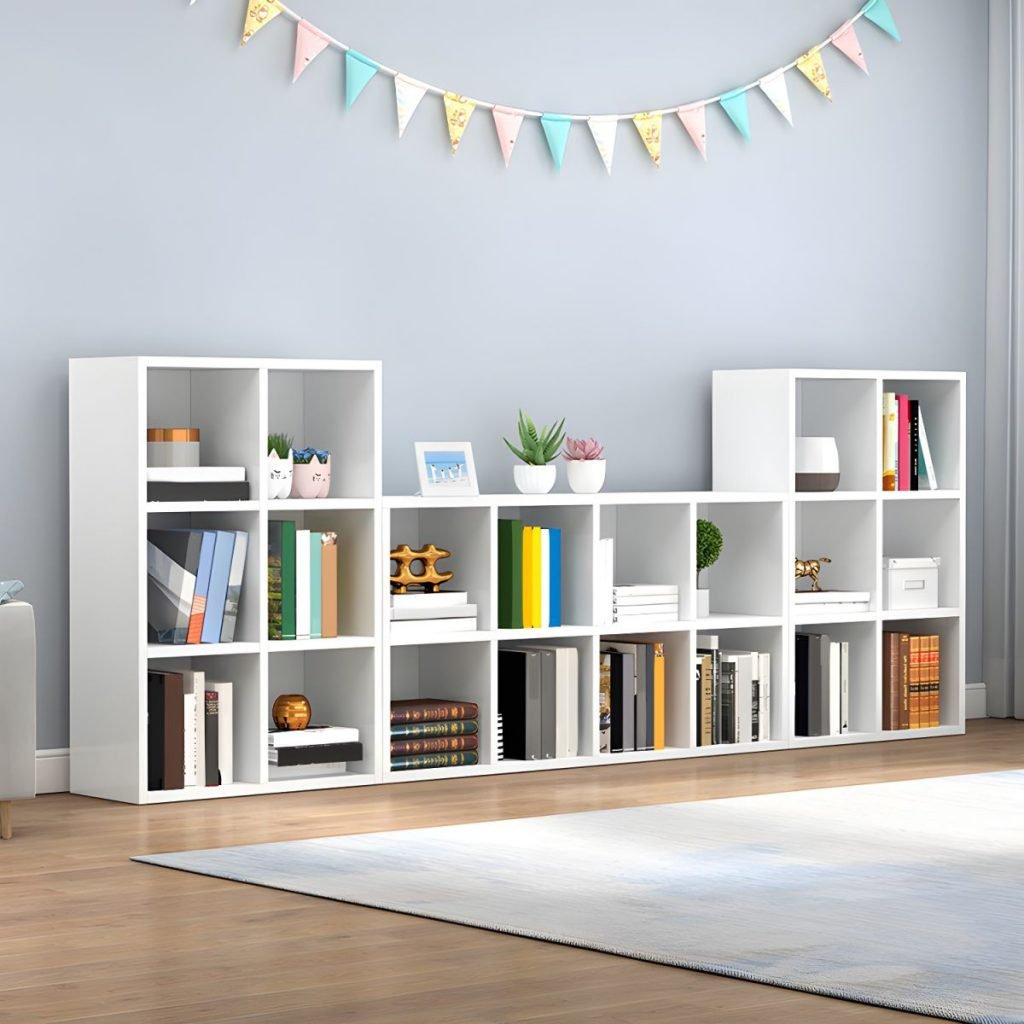A tall, Modern White Bookcase featuring a 5-tier Open Shelves design. The Minimalist Wooden Bookshelf stands 71 inches high in a crisp white finish, showcasing a clean and airy structure. Styled with books and minimalist decor, this White Storage Cabinet and Wooden Display Shelf represent an easy-to-install board construction for contemporary homes.