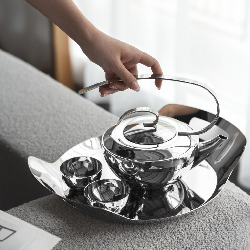 141 7 1 Steel Teapot Set for Modern Tea Service - Luxury Mirror Polished Stainless Steel Tea Pot and Cup Collection by Apexerahomelife.