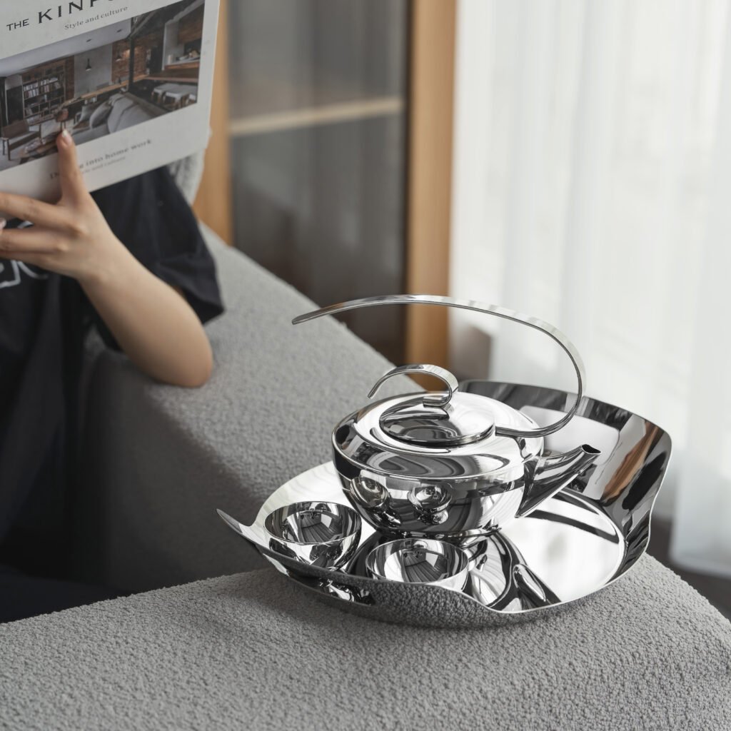 141 8 1 Steel Teapot Set for Modern Tea Service - Luxury Mirror Polished Stainless Steel Tea Pot and Cup Collection by Apexerahomelife.