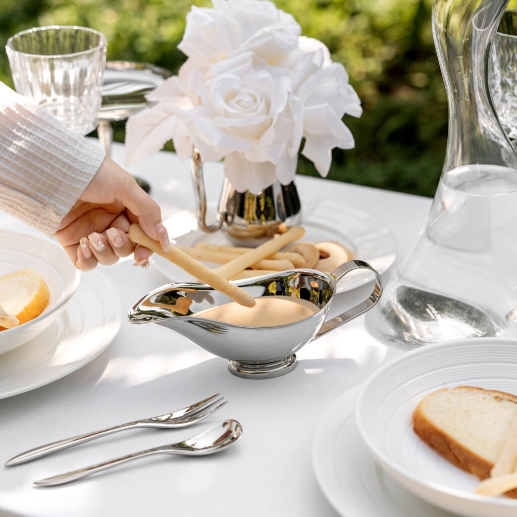 153 4 1 Steel Sauce Boat for Formal Dining, Luxury Mirror Polished Gravy Pitcher with Designer Geometric Handle.