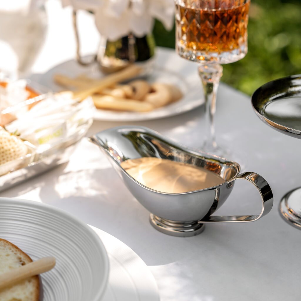 153 7 1 Steel Sauce Boat for Formal Dining, Luxury Mirror Polished Gravy Pitcher with Designer Geometric Handle.