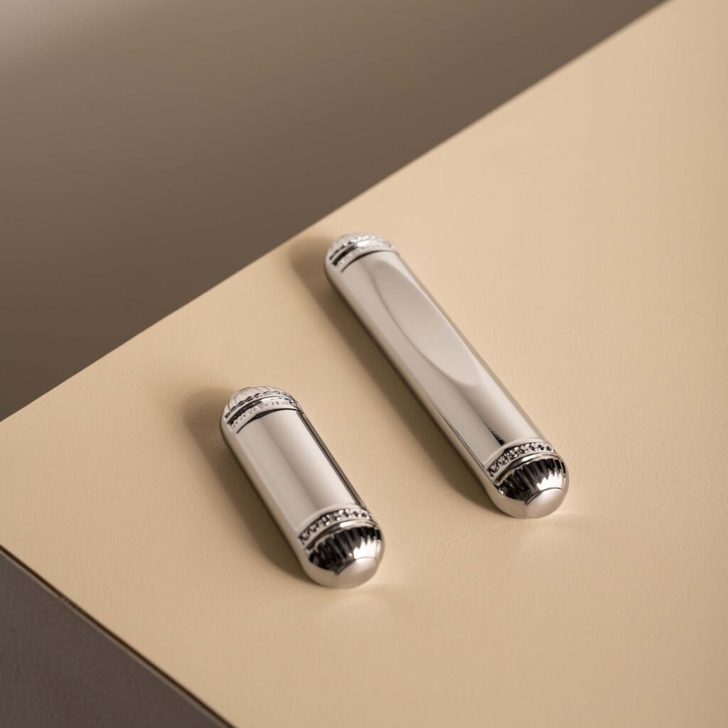 Steel Flatware Rest placed on a slate grey table setting with silver chopsticks, representing Reflective Minimalist Dining Accessory elegance.