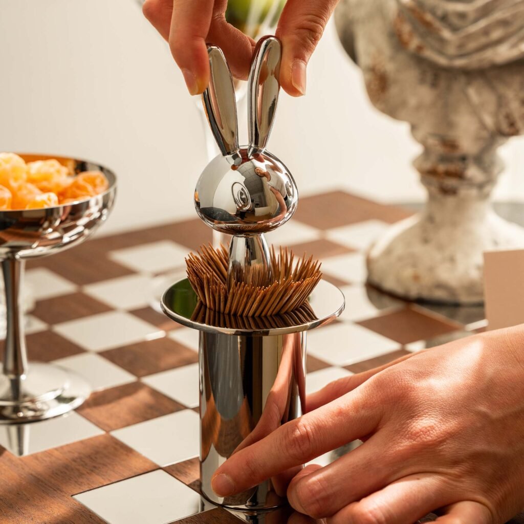 Close-up of the Modernist Animalistic Tableware, highlighting the flawless reflective surface and the precision-milled ear details.