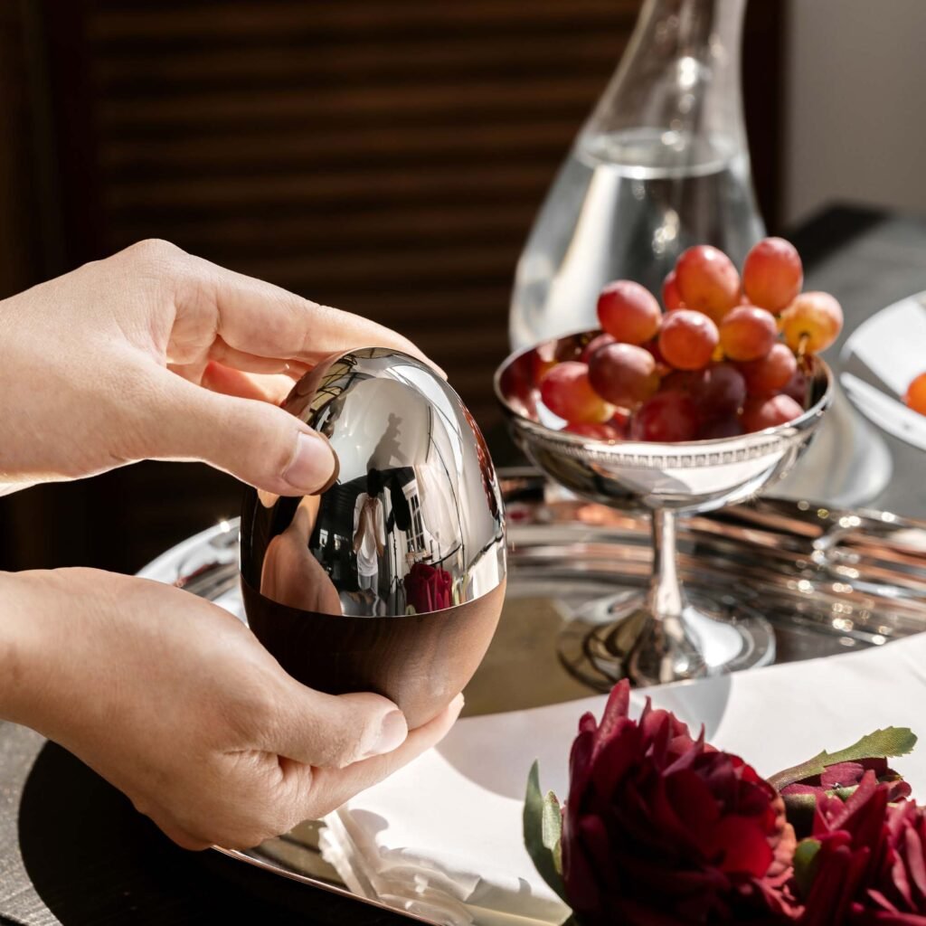 Steel Fruit Picks placed on a slate serving board with fresh fruit, representing Reflective Whimsical Dining Art elegance.