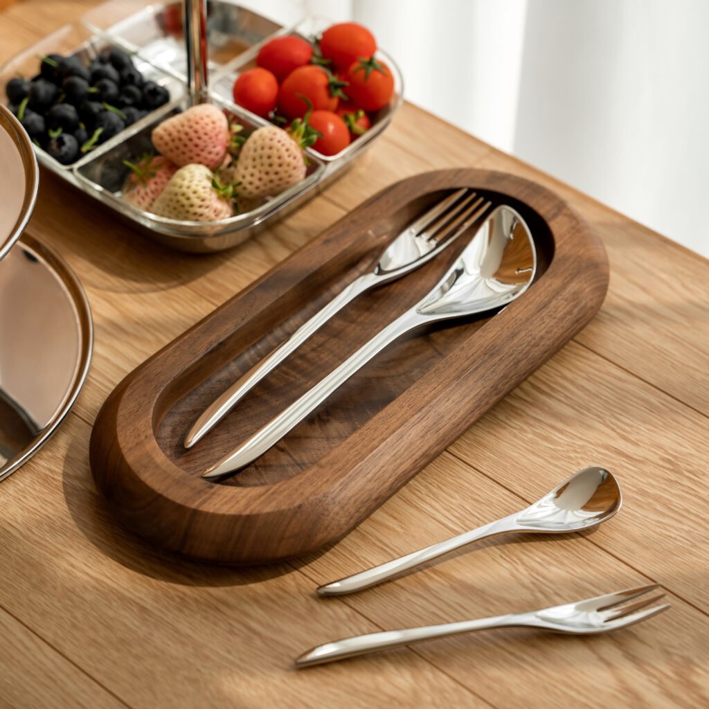 Steel Flatware Set featuring a complete place setting with knife, fork, and spoons, showcased as Luxury Mirror Polished Cutlery.