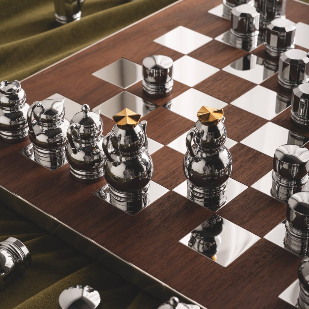 Close-up of the Modernist Metallic Game Collection, highlighting the deep-set laser-etched characters and the flawless chrome-like reflection on each piece.