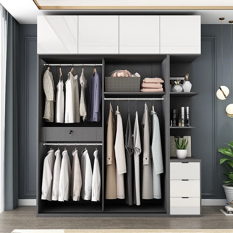 Close-up of the Handleless Push-to-Open Armoire mechanism on the top cupboards by Apexerahomelife, showcasing the premium Eco-Friendly E0 Grey Closet finish.