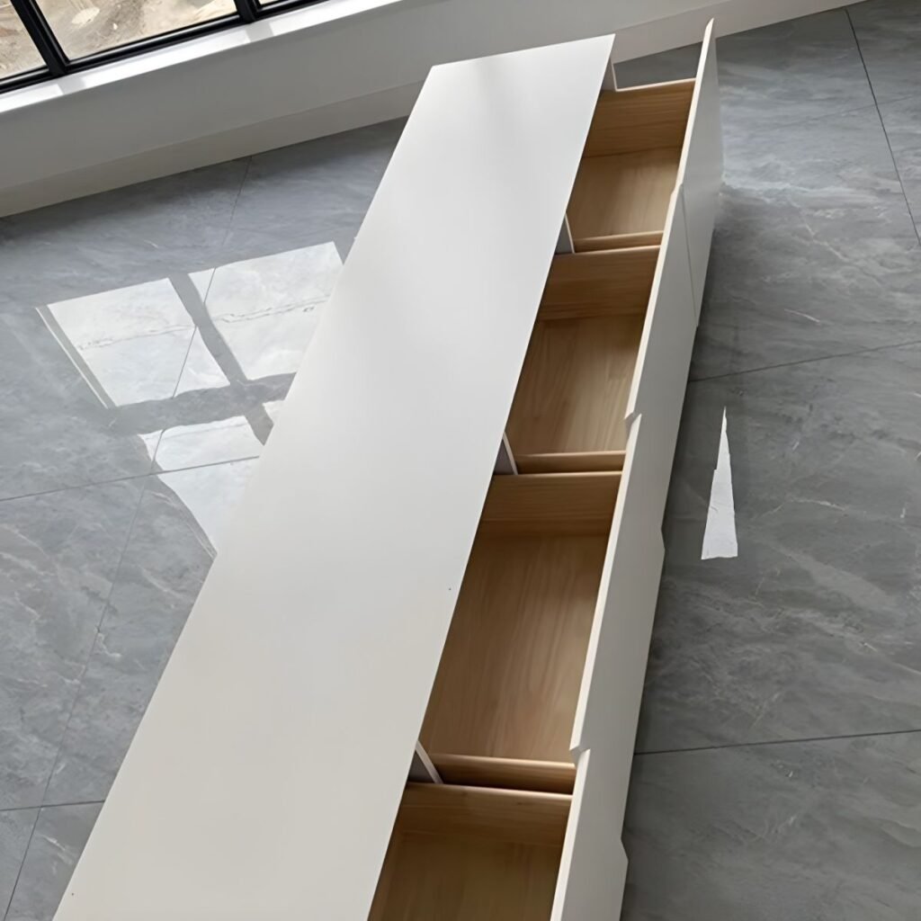 Close-up of the Quiet Buffer Storage Stand drawers, showing hidden handles and high-performance buffer rails on an E0 wood base.