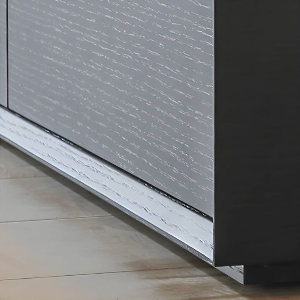 Close-up of the black wood grain texture on the Sleek 4 Drawer TV Cabinet, featuring hidden handles and professional buffer slides.