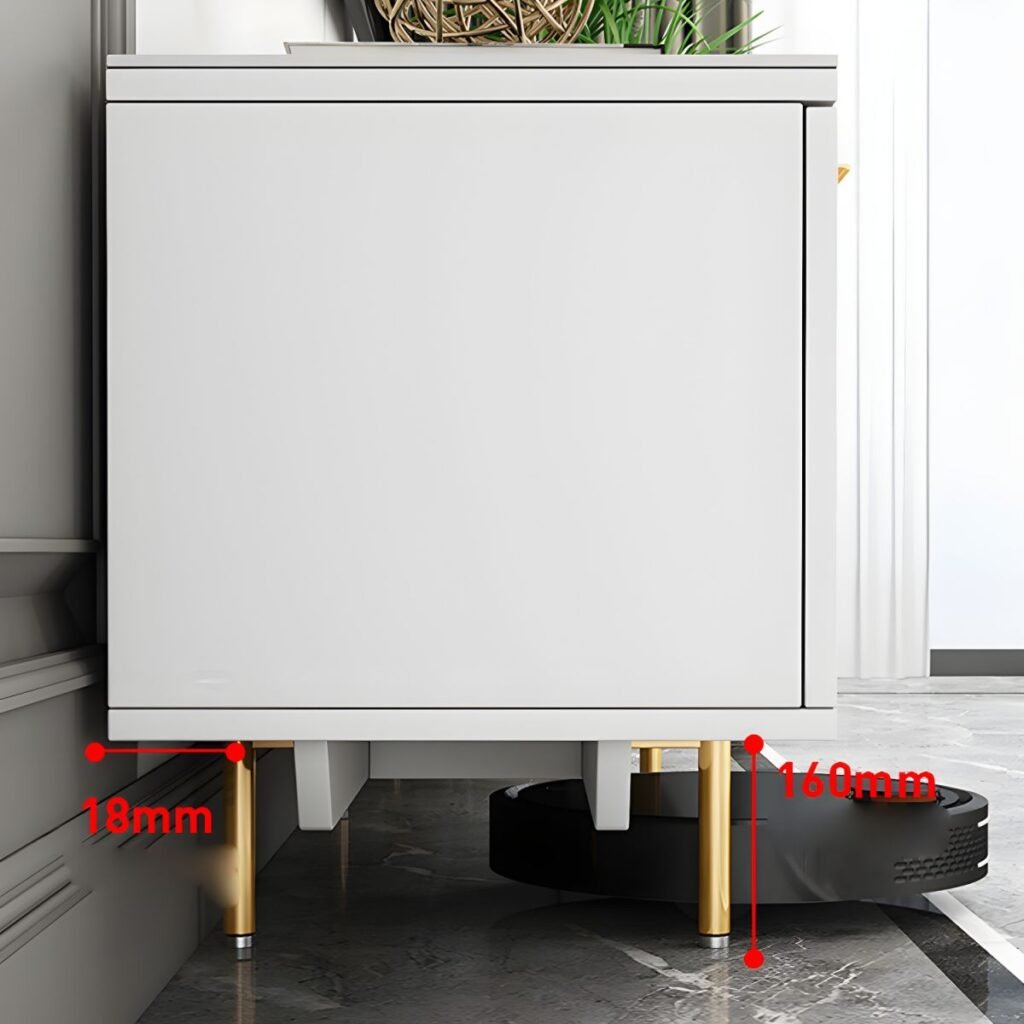 Close-up of the gold metal legs and the soft-close drawer mechanism on a Sleek White Media Console, showing E0 wood texture.