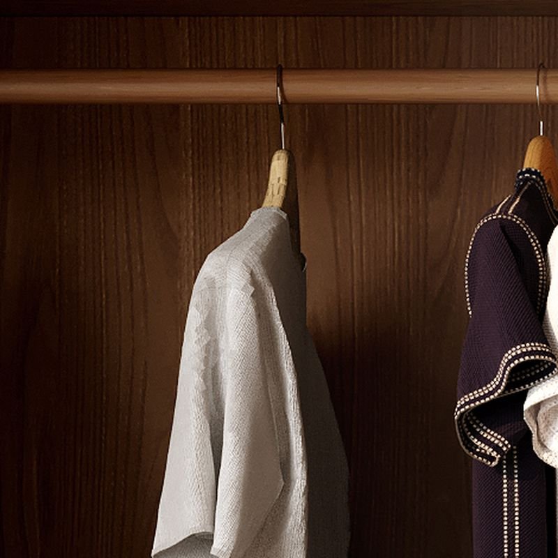 Detailed view of the Modern Industrial Bedroom Closet with premium oak textures and Sustainable E0 Wood-Grain Storage boards by Apexerahomelife.