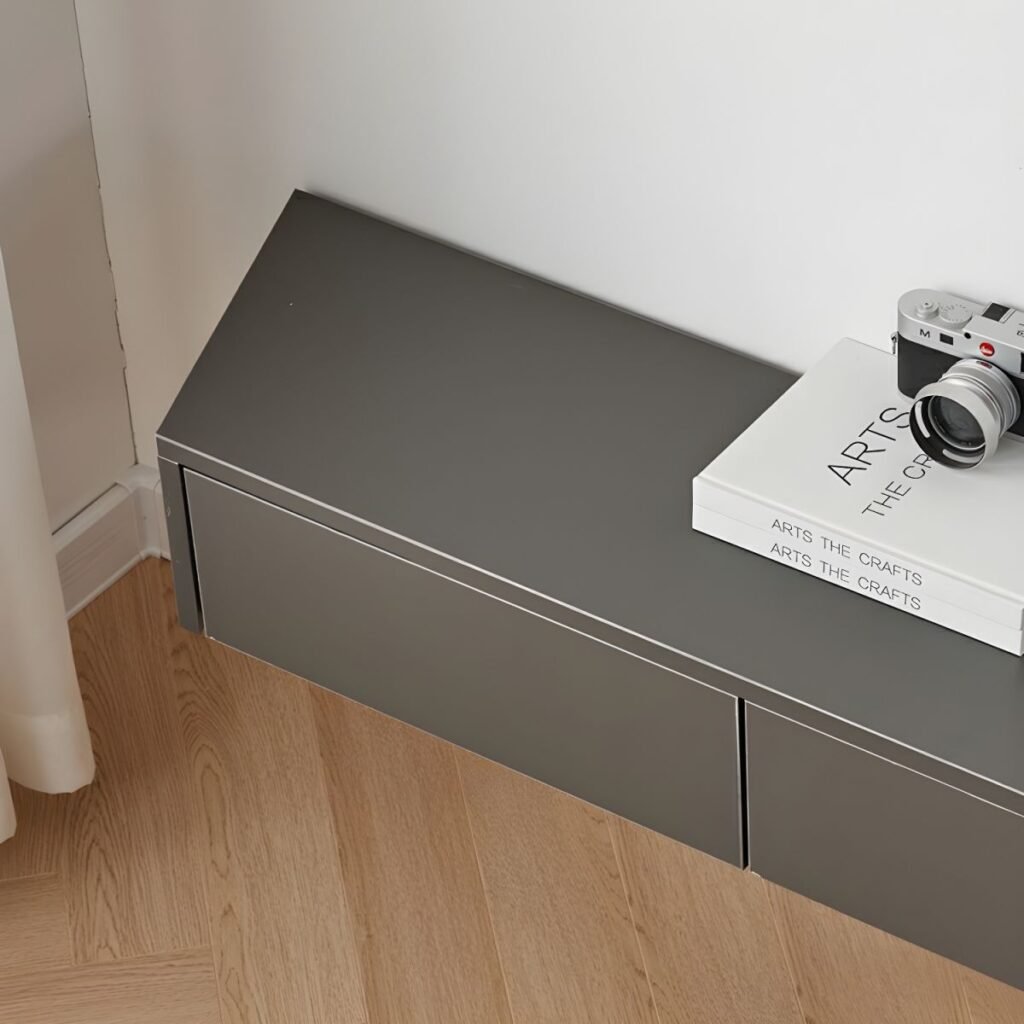 Lifestyle shot of the Extra Long Grey Floating TV Unit under a 100-inch screen, highlighting the slim 18cm height and 30cm depth.