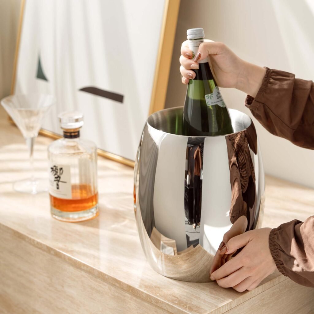 Close-up of the Architectural Flat Handle Barware, highlighting the precision-jointed handle and the flawless, deep-set reflective finish.