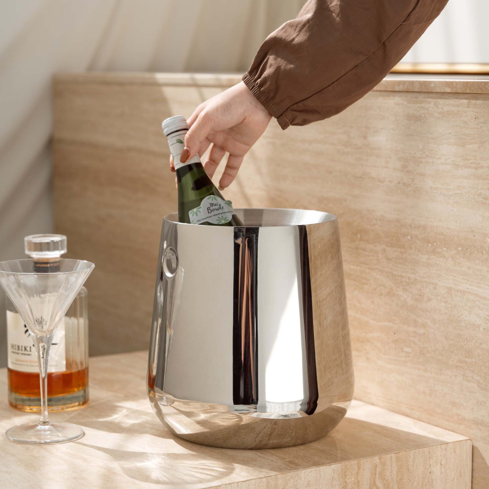 Steel Ice Bucket featuring a minimalist recessed handle and matching tongs, showcased as a Luxury Mirror Polished Wine Chiller.