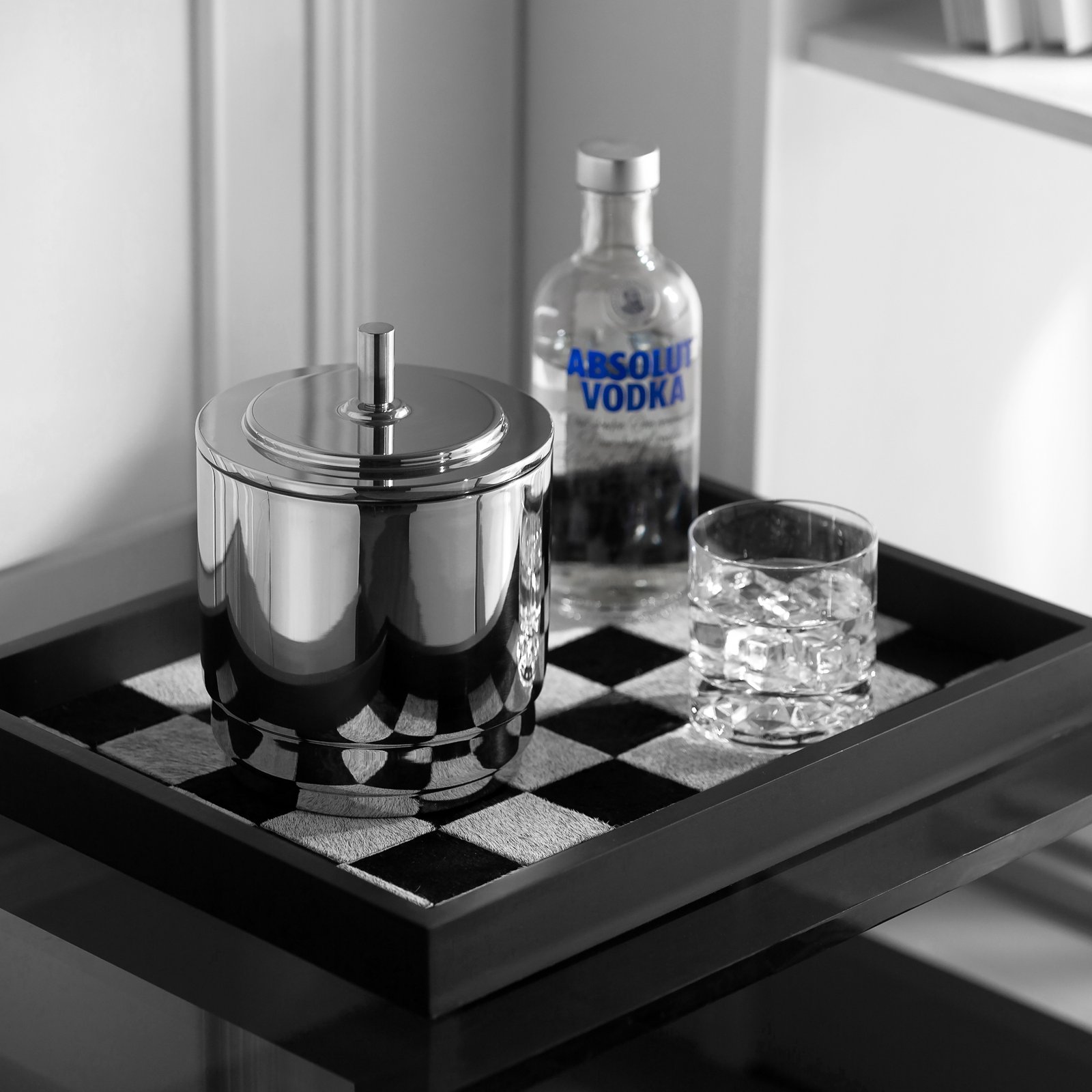 Steel Ice Bucket featuring a symmetrical arch handle and matching tongs, showcased as a Luxury Mirror Polished Wine Chiller.
