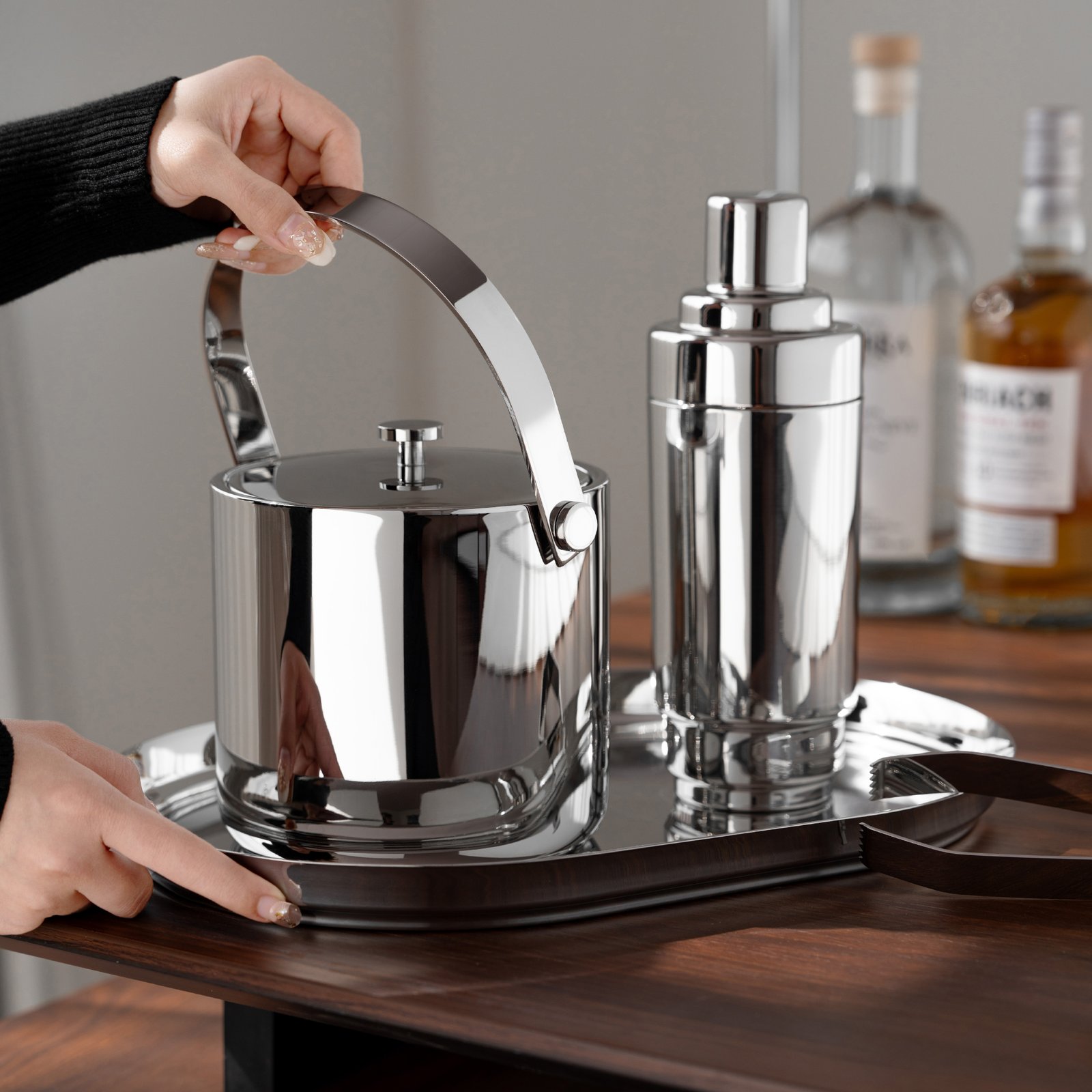 Steel Ice Bucket featuring a double-wall structure and matching tongs, showcased as a Double Wall Vacuum Chiller for luxury hosting.