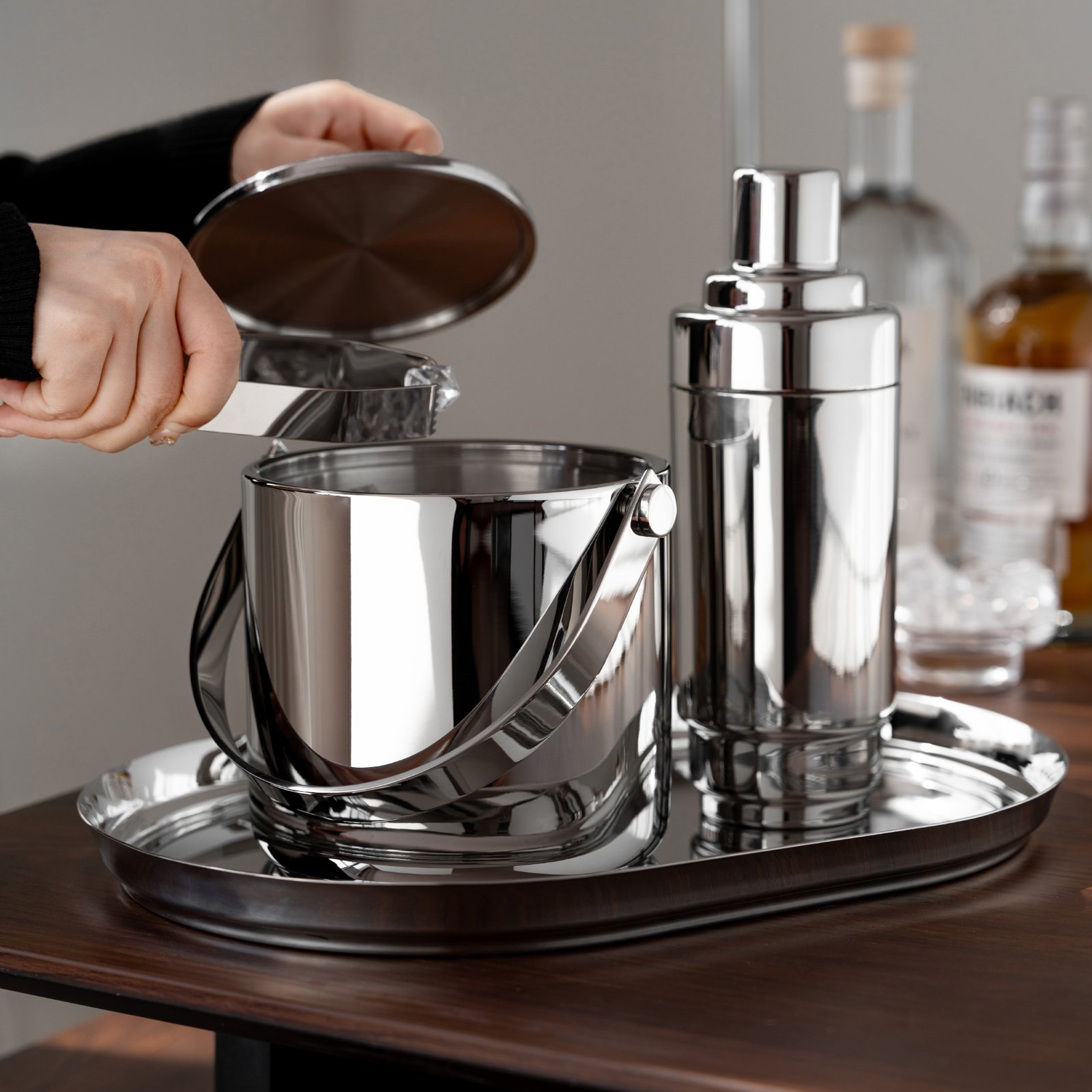 Close-up of the Luxury Mirror Polished Barware, highlighting the smooth integrated handles and the flawless, deep-set reflective finish.