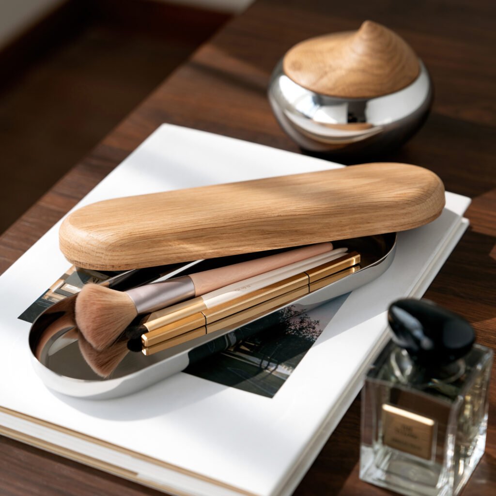 Steel Storage Box (SS-14) featuring a mirror-polished low-profile cylindrical body and a precision-fitted lid, showcased as a Luxury Mirror Polished Utility Vessel.