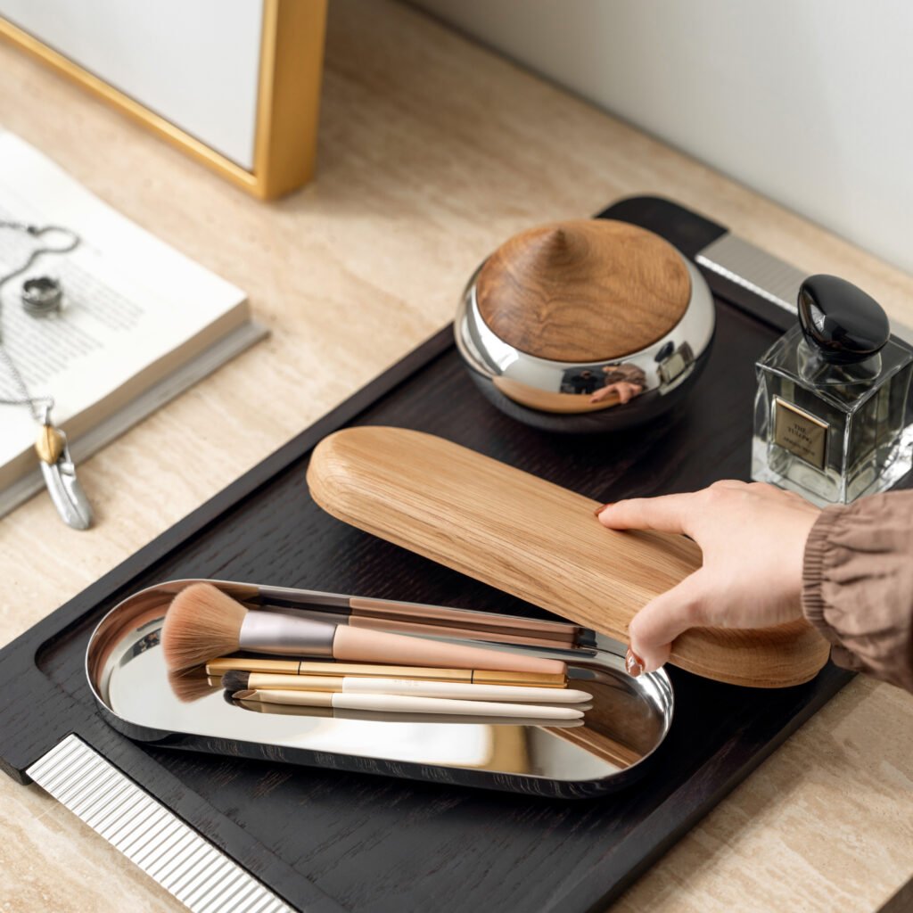 Steel Storage Box placed on a dark leather desk pad beside a premium fountain pen, representing Reflective High-End Functional Art elegance.