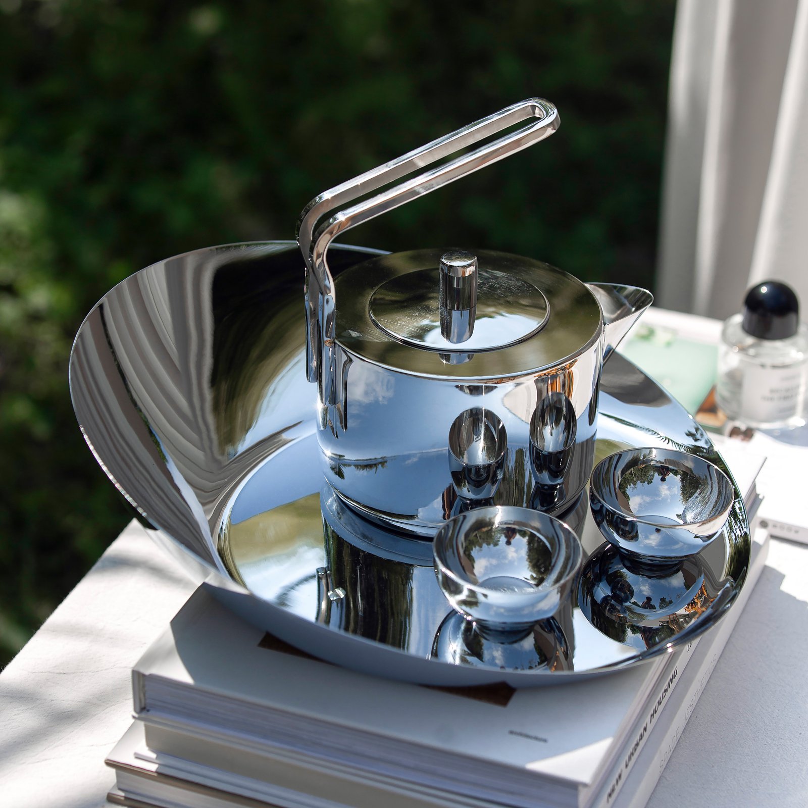 Modern Teapot being used in a minimalist studio, representing Reflective Executive Single Server elegance.