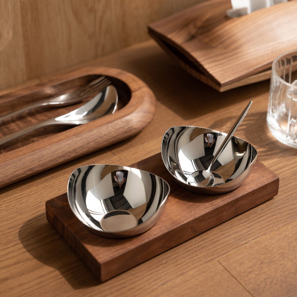 Close-up of the Modernist Hemispherical Metalware, highlighting the ultra-smooth interior and the flawless panoramic reflection across the steel surface.