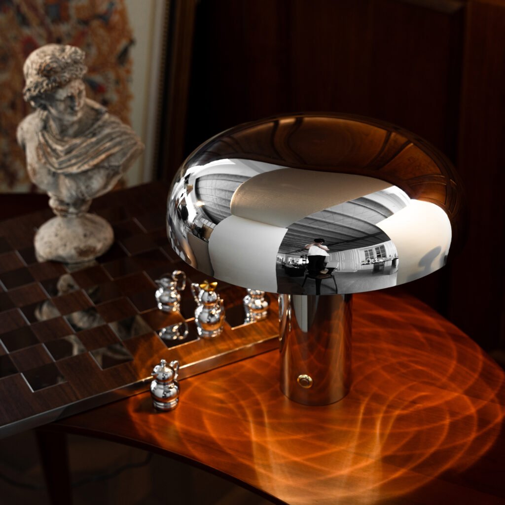 Close-up of the Modernist Dome Metalware, highlighting the flawless panoramic reflection of the room across the expansive steel top and integrated base.