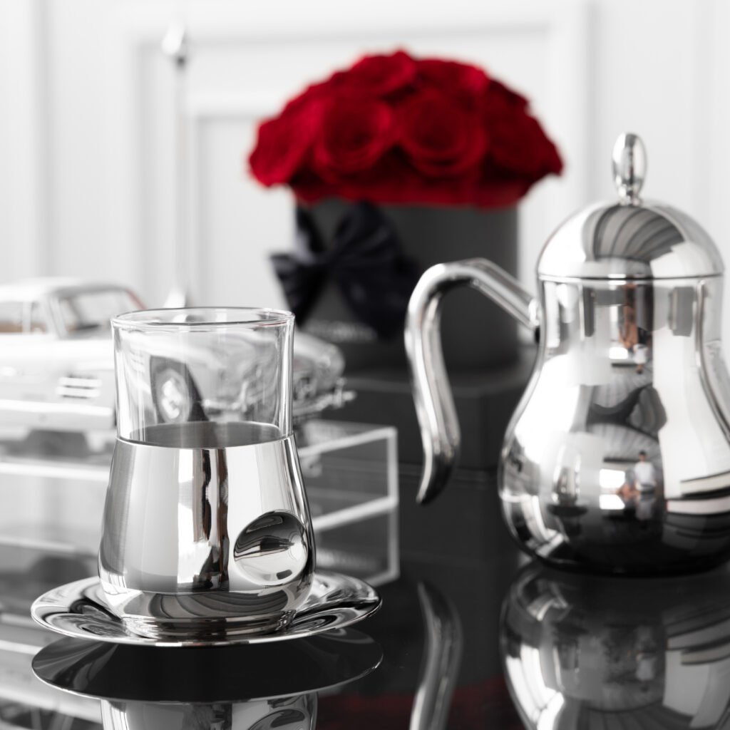 Steel European Carafe (SS-36) featuring a curved S-spout and classical body for professional beverage service, showcased as a Luxury Mirror Polished Coffee Pot.