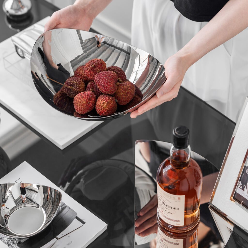 Mirror-polished Steel Orbital Platter SS-60 with streamlined avant-garde design