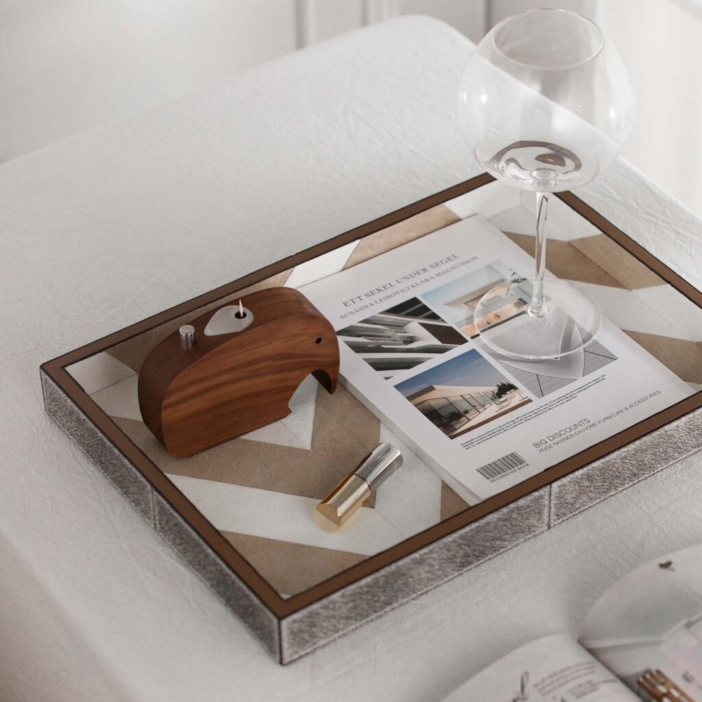 Close-up of the Modernist Minimalist Metalware, highlighting the ultra-smooth surface and the flawless, liquid-like reflection across the steel capsule.