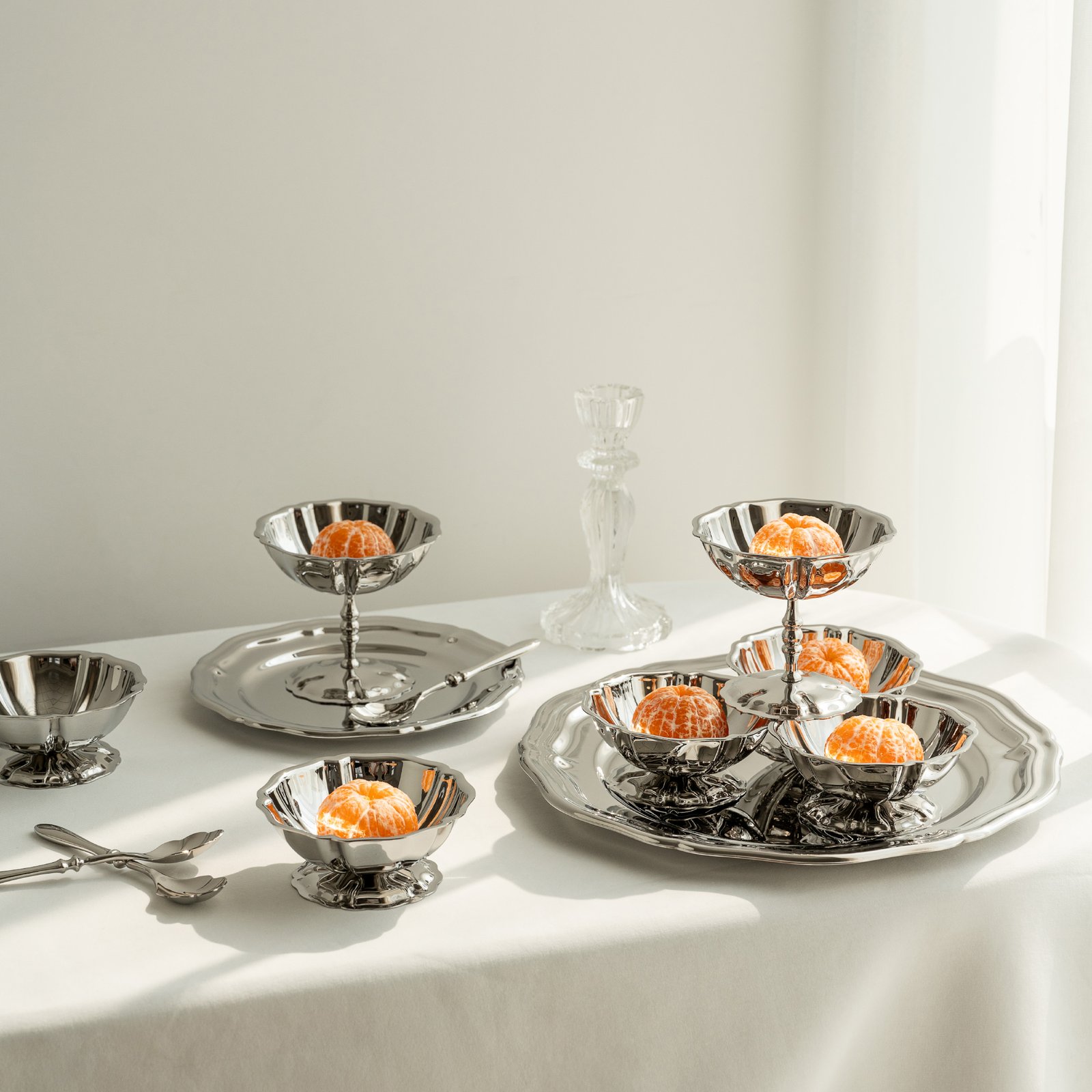 Steel Low Bowl placed on a rustic stone surface with a decadent chocolate mousse, representing Reflective Minimalist Serving Art elegance.
