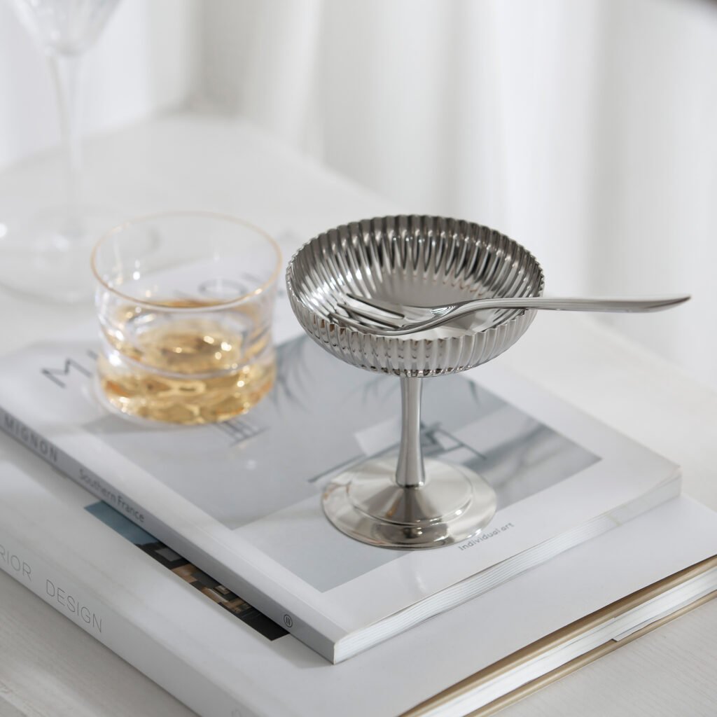 Steel Ribbed Cup (SS-90) featuring a mirror-polished body with vertical linear textures, showcased as a Luxury Mirror Polished Striped Bowl.