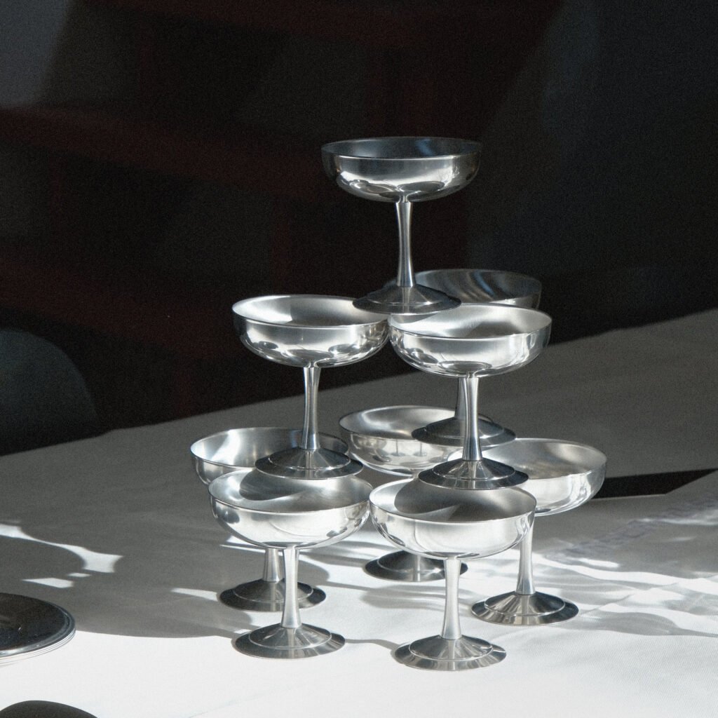 Steel Dessert Cup (SS-89) featuring a mirror-polished tulip-shaped bowl on a pedestal, showcased as a Luxury Mirror Polished Tulip Bowl.