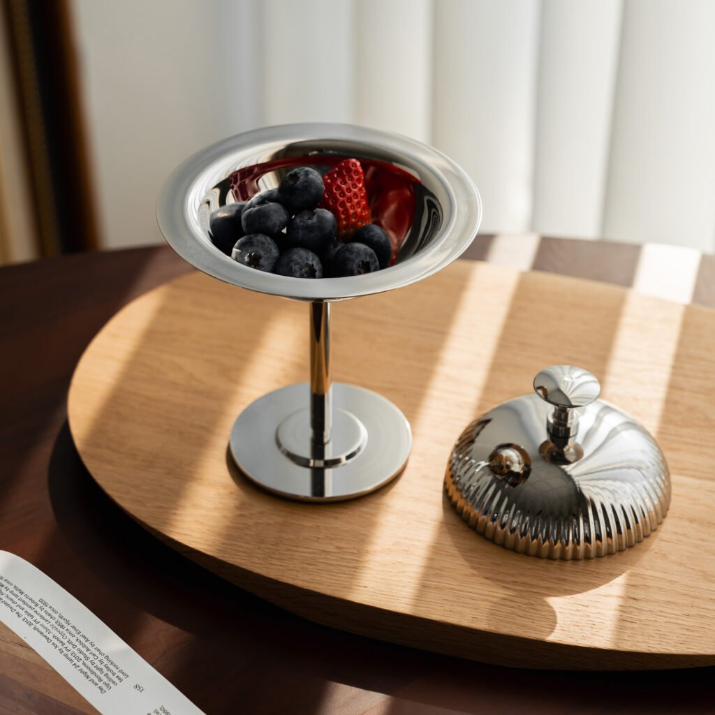 Steel Dessert Server (SS-93) featuring a mirror-polished bowl with a matching lid and spherical handle, showcased as a Luxury Mirror Polished Covered Bowl.