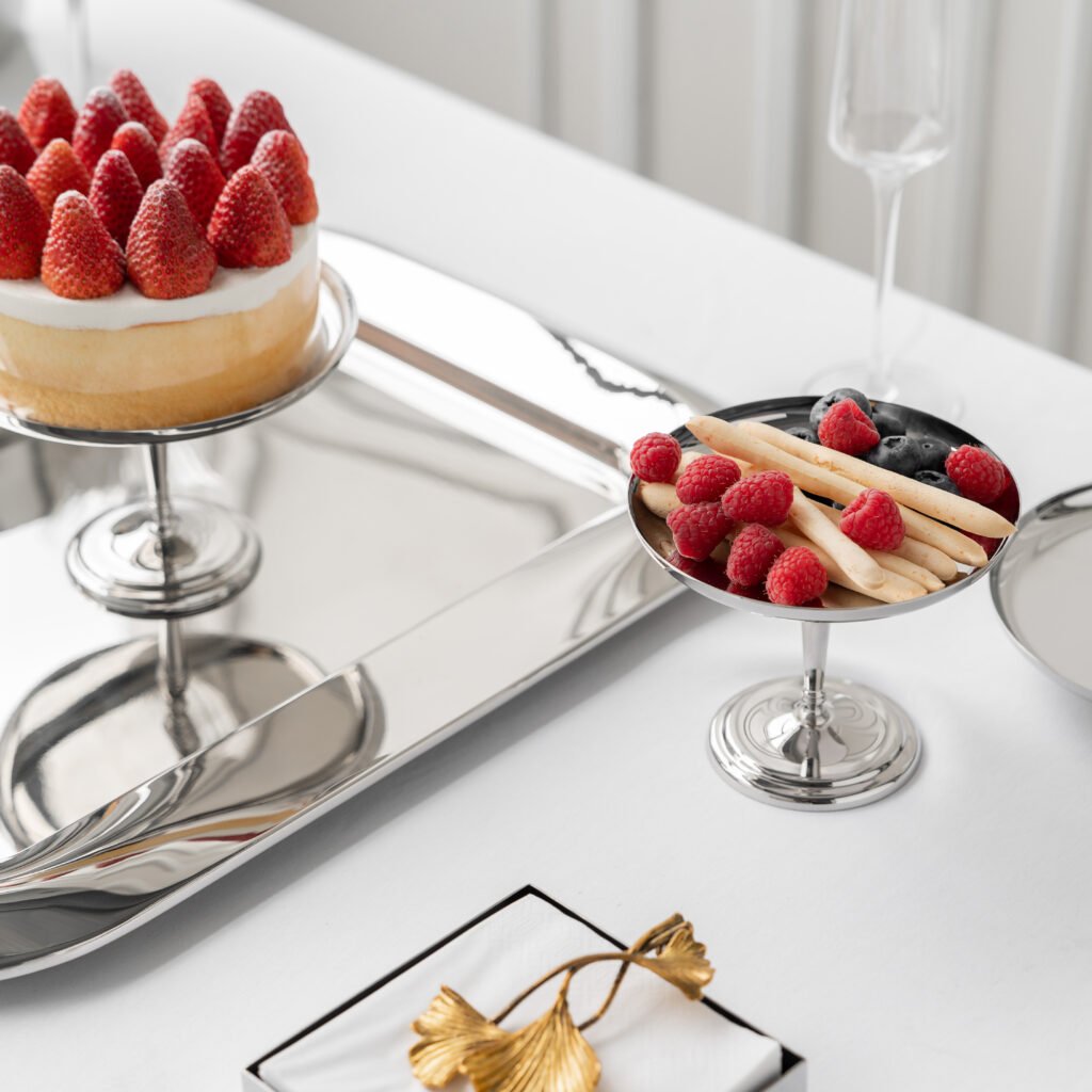 Steel Cake Dish (SS-94) featuring a mirror-polished circular surface for cakes and pastries, showcased as a Luxury Mirror Polished Pastry Plate.