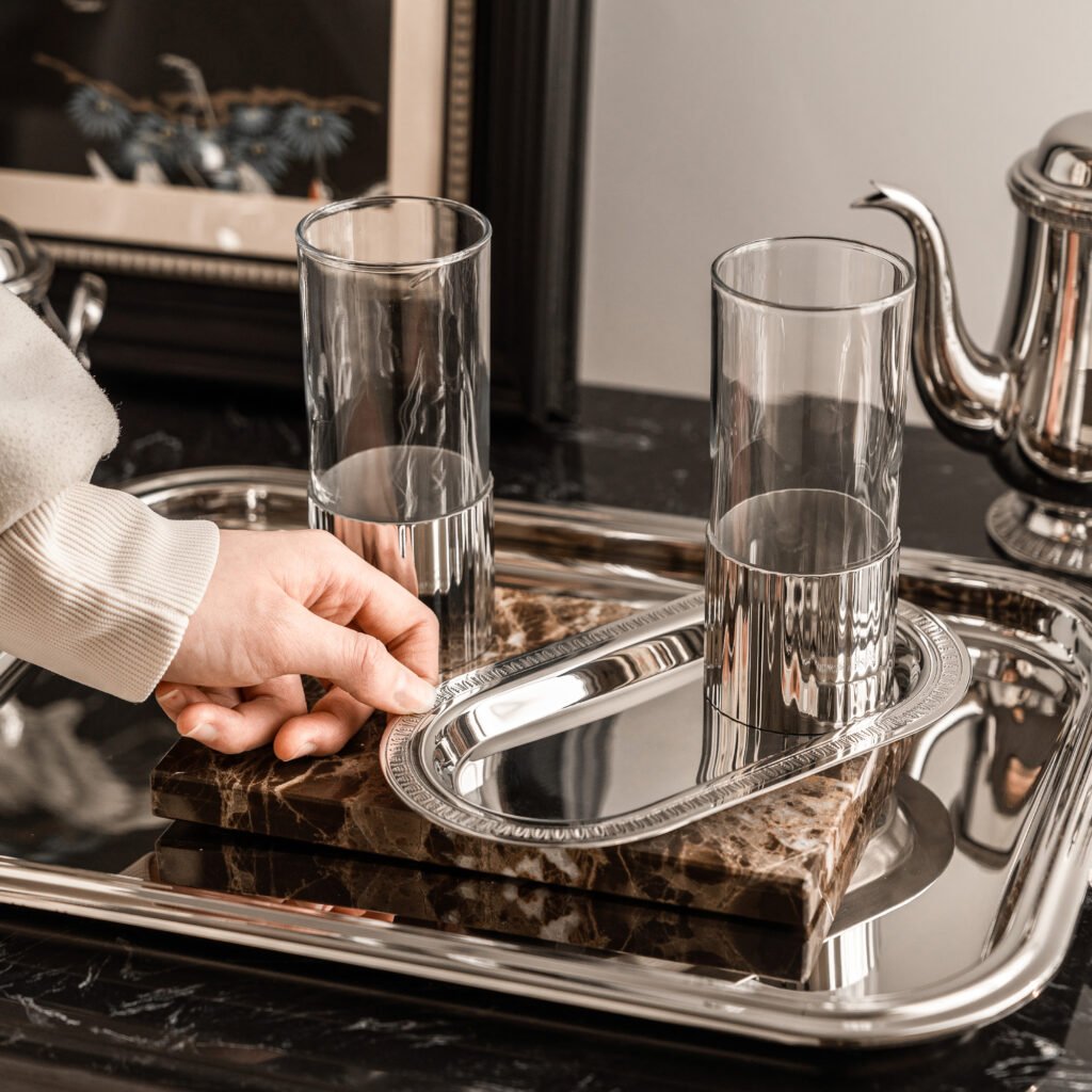 Steel Vintage Tumbler (SS-96) with its matching mirror-polished tray, showcased as Luxury Mirror Polished Drinkware.