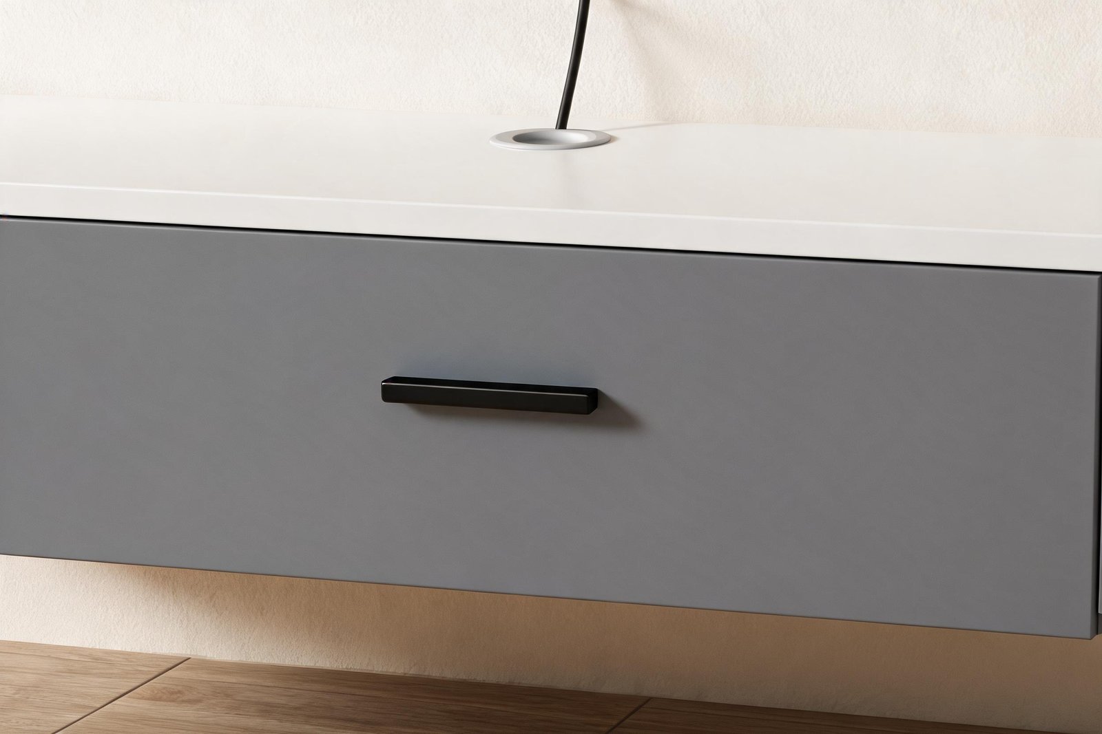 How to Hide TV Cables: 7 Proven Fixes | Apexera 3 Cable grommet in the white top panel of a grey floating media console showing how to hide tv cables