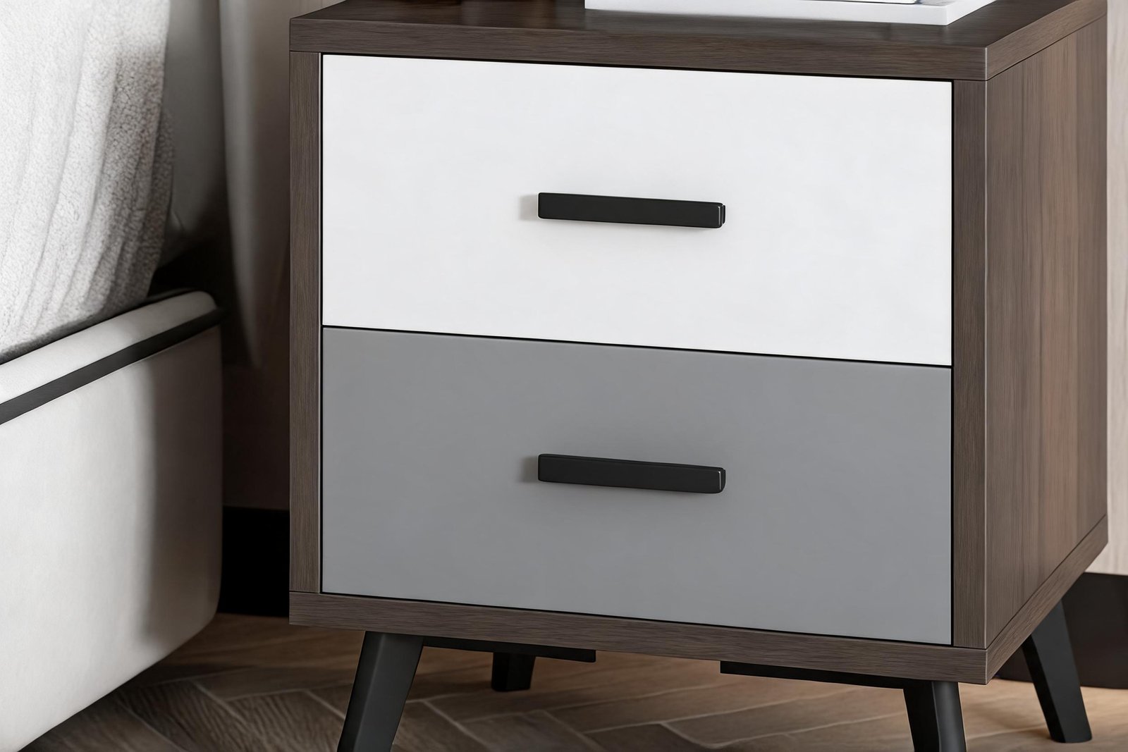 White upper drawer front and grey lower drawer front with slim black bar handles on a dark walnut nightstand, photographed after comparing nightstand height to bed height