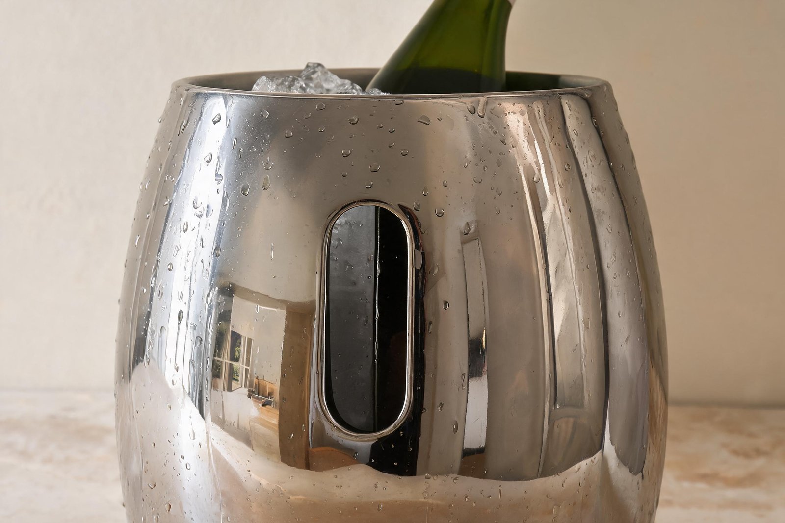 Ice bucket for bar cart detail: the recessed oval cut-out handle that lets the bucket sit flush to the cart frame